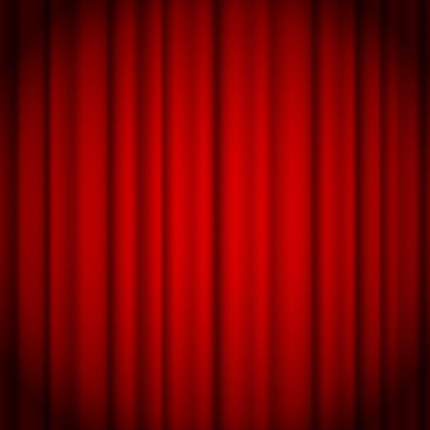 a red curtain with the light shining on it's side, as if in an auditorium