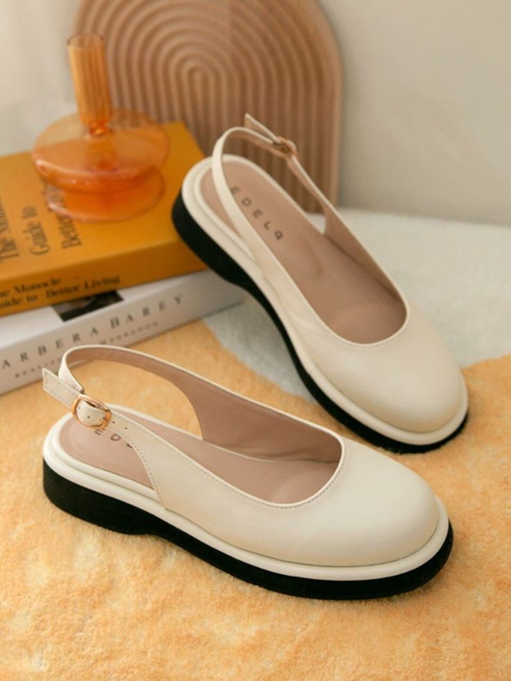 Editor's Notesedel9's shoes are classic and perfect for daily lifestyle.- Stable fit with non-slippery outsole and low height heel- Simple and casual shaped toe- Easy to wear with banding strap- Comfortable to wear with cushion insoleMeasurements(in.)KR size- Size: KR 225MM (US 5.5) - KR 250MM (US 8)- Heel height: 1.38 in.Composition & Care- Shell: Faux Leather  Lining: Faux Leather- Avoid direct heat and moisture- Professional cleaning is neededDesigner- by edel9 Casual Medium Width Closed Toe Slingback Pumps, Casual Low Heel Slingback Pumps, Casual Beige Slingback Pumps With Round Toe, Casual Slingback Pumps With Low Heel And Medium Width, Casual Beige Slingback Pumps With Closed Toe, Beige Casual Closed Toe Slingback Pumps, Casual Beige Closed Toe Slingback Pumps, Casual Slingback Pumps With Leather Sole, Comfortable Slingback Sandals With Round Toe And Heel Strap