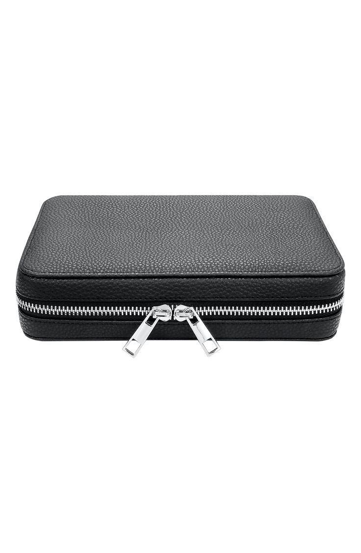 This sleek leather travel case lets you take your favorite watch bands with you wherever you go. Leather Imported Modern Wallets With Case For Travel, Modern Black Travel Accessories For Formal Occasions, Black Modern Travel Accessories For Formal Occasions, Classic Leather Wallet, Black Modern Formal Travel Accessories, Travel Leather Wallet, Black Rfid Blocking Business Travel Accessories, Modern Travel Wallet With Rectangular Case, Black Round Case For Everyday Use