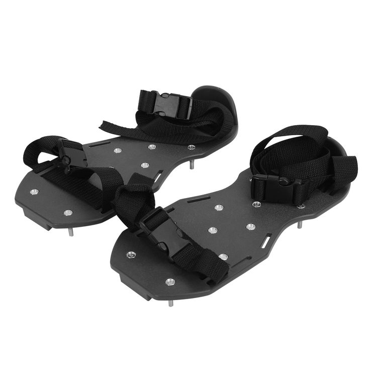 two pairs of black sandals with white dots on them