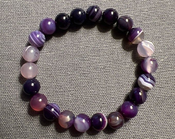 Pearly Purple Bracelet - Etsy Purple 8mm Beads Bracelets As Gift, Purple Bracelets With 8mm Beads As Gift, Purple 8mm Beaded Bracelet, Purple Stretch Bracelet With Gemstone Beads As Gift, Purple Agate Bracelets, Purple Gemstone Beads Stretch Bracelet As Gift, Purple Stretch Bracelet With Round Beads As Gift, Purple Hand-strung Beaded Bracelets As Gift, Handmade Amethyst Stretch Bracelet In Purple