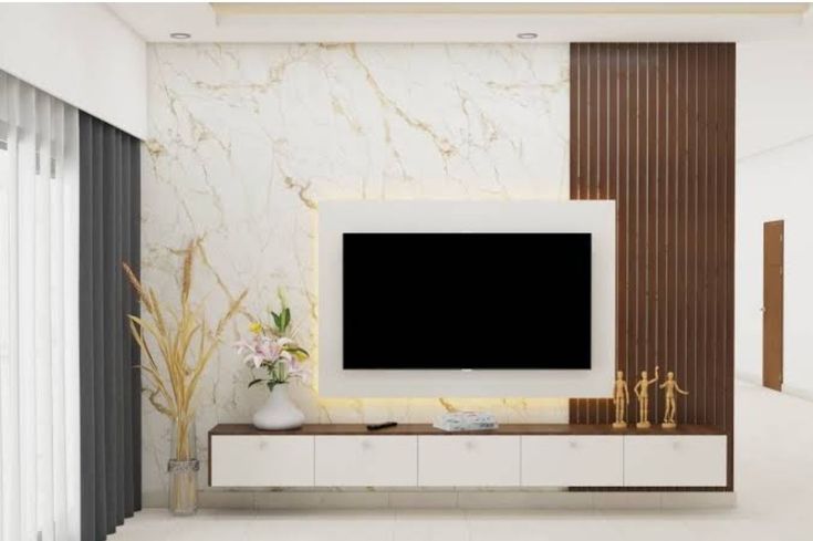 a living room with marble walls and white furniture