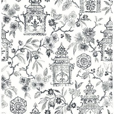 an ornate wallpaper pattern with black and white flowers