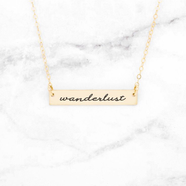 Wanderlust - Gold Quote Bar Necklace If you're a wayfaring princess, a fan of the great outdoors, a road trip junkie, or a frequent flyer, then this beautiful gold Wanderlust necklace is for you! This dainty bar necklace is the perfect accessory to wear on its own or to layer with other lovely chains. This makes the perfect gift for a birthday, anniversary, Valentine's Day, Christmas, a Graduation, or just because! This pretty Wanderlust necklace is perfect for the wanderer or adventure seeker! Gold Bar Necklace Engraved, Rose Gold Quotes, Silver Quotes, Dainty Bar Necklace, Gold Bar Necklace Personalized, Horizontal Bar Necklace, Rose Gold Bar, Engraved Bar Necklace, German Quotes