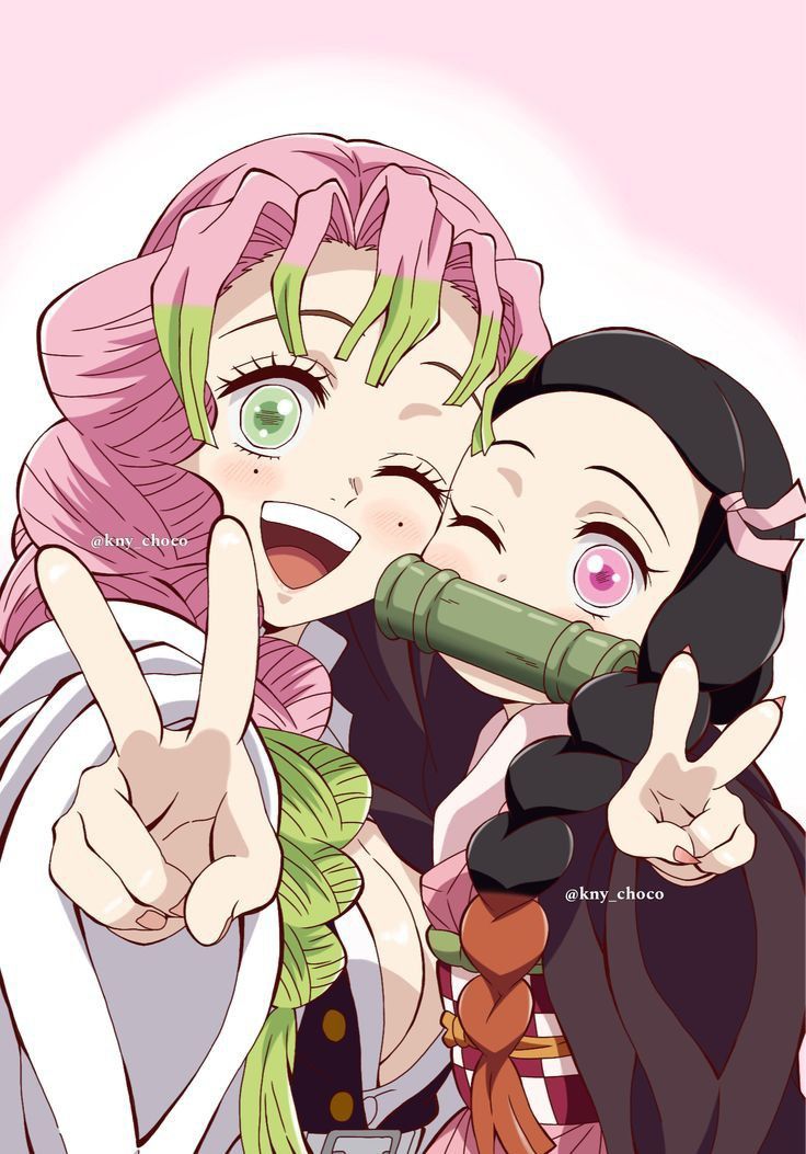 two people with pink hair and green eyes, one pointing at the camera while the other points