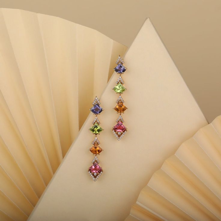 The colorful Confetti Veil earrings are chic and fun earrings with an intricate design and an out-of-the-box attitude. These flamboyant and colorful earrings can complement almost any attire, especially monochromes that need a pop of color. This is the perfect gift for the person in your life who wants more out of life. Elegant Multicolor Earrings For Formal Occasions, Luxury Multicolor Earrings For Formal Occasion, Luxury Multicolor Earrings With Gemstone Accents, Multicolor Gemstone Accented Fine Jewelry Earrings, Multicolor Gemstone-accented Fine Jewelry Earrings, Luxury Multicolor Drop Earrings, Luxury Multicolor Earrings For Evening, Multicolor Multi-stone Jewelry For Evening, Multicolor Dangle Earrings For Formal Occasions