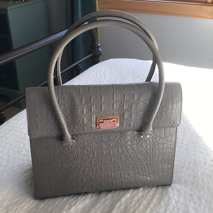 New Without Tags! Never Used Just Been Stored. Croc Embossed Handbag! Grey Very Well Kept And Clean Just A Few Tiny Marks From Being Stored (See Photos) Very Nice And Has A Lot Of Room. Can Be Worn As A Shoulder Bag Also: ) 13.5”Lx11”H Smoke Free Pet Free Home Gray Top Handle Shoulder Bag For Office, Gray Shoulder Bag With Detachable Handle For Office, Designer Gray Bags For Daily Use, Elegant Gray Satchel With Top Carry Handle, Formal Gray Bag With Detachable Strap, Formal Gray Top Handle Bag, Gray Satchel Shoulder Bag For Formal Occasions, Elegant Gray Satchel Shoulder Bag, Gray Rectangular Bag For Formal Occasions