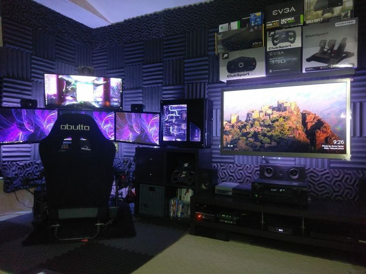 a room filled with lots of different types of video game monitors and gaming equipment in it