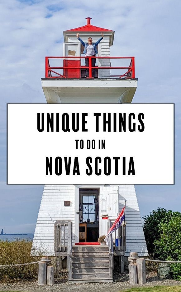 a white lighthouse with the words unique things to do in nova scotland on it's side