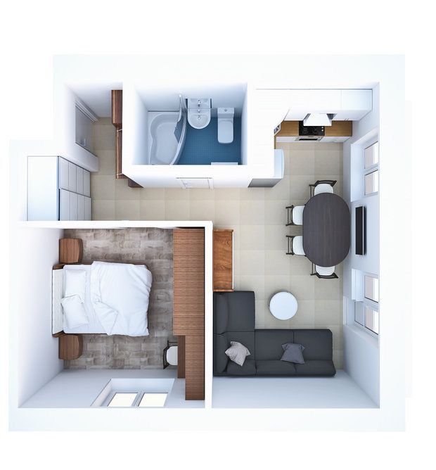 an overhead view of a bedroom and living room in a small apartment with one bed