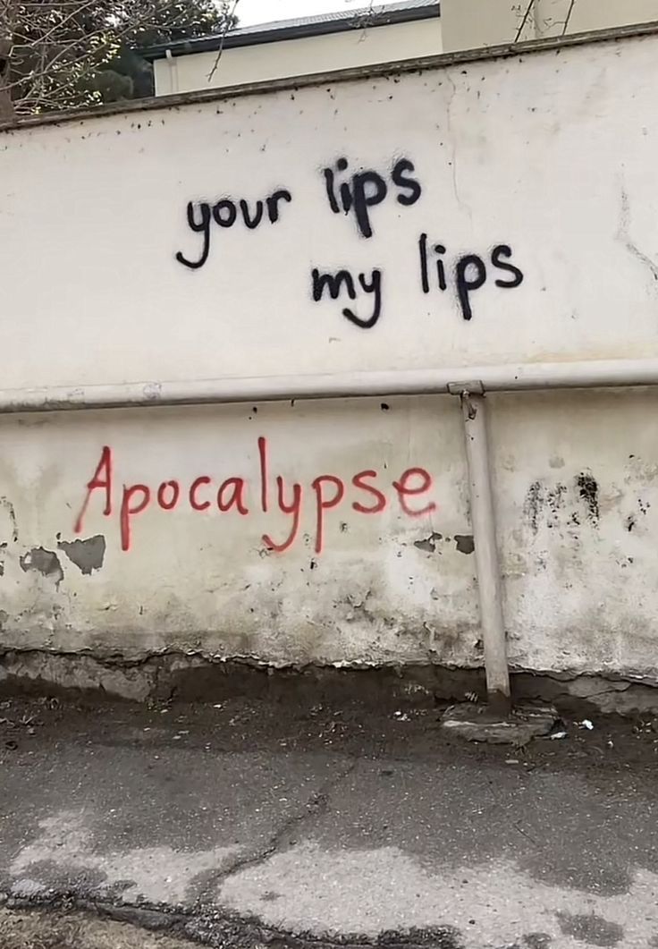 graffiti on the side of a building that says, your tips my lips appcalypse