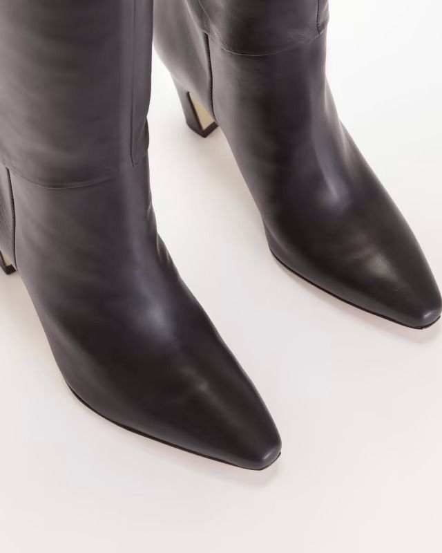 The Knee-High Banana Heel Boot Black – Everlane Luxury Knee-high Heeled Boots For Business, Elegant Mid-calf Boots In Calf Leather With Leather Lining, Elegant Mid-calf Boots With Calf Leather, Sculpted Heel Knee-high Boots For Business, Luxury Knee-high Boots With Sculpted Heel For Work, Luxury High Heel Knee-high Boots For Business, Elegant Knee-high Boots In Calf Leather With Leather Lining, Elegant Leather Knee-high Boots For Work, Elegant Knee-high Boots With Leather Lining