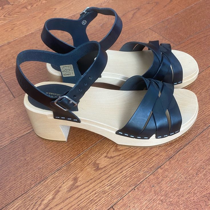 Brand New Never Worn, Sold Out Us 8 Eu 39 Beach Heels With Wooden Heel And Closed Toe, Black High Heel Clogs For Summer, Black Sandals With Heel Loop And Ankle Strap, Black High-heeled Clogs For Summer, Chic Closed Toe Sandals With Wooden Heel, Black Sandals With Wooden Heel For Summer, Beach Clogs With Heel Strap, Black Sandals With Heel Strap And Medium Width, Black Sandals With Heel Strap And Block Heel