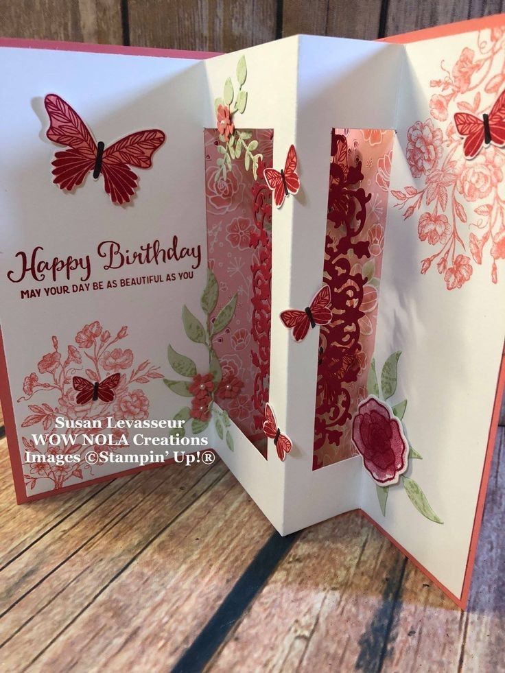 an open birthday card with butterflies on it