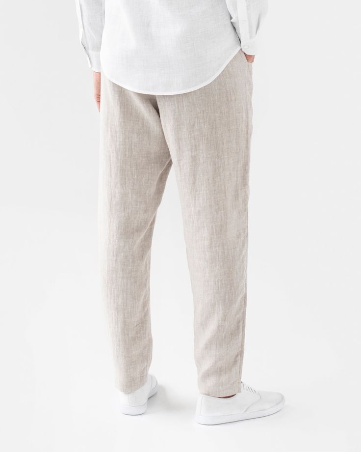 Summer outfits made easy. Our linen pants TRUCKEE with cargo pockets and elasticated waist adjustable by drawstrings are a starting piece that helps create the best summer outfits. Style it with a loose fit linen shirt, a tucked in t-shirt, cozy it up adding a sweater – all is possible. Linen pants come in three colors – white, natural mélange, cinnamon – the more colors you have, the more styling possibilities you unlock. • Elasticated waist with drawstrings • Cargo pockets Please note that due Beige Linen Bottoms With Elastic Waistband, Linen Cargo Pants With Elastic Waistband For Loungewear, Beige Linen Pants With Elastic Waistband, Summer Tapered Leg Cargo Lounge Pants, Casual Ramie Bottoms With Relaxed Fit, Summer Tapered Leg Cargo Pants For Loungewear, Linen Cargo Pants With Pockets For Loungewear, Relaxed Fit Linen Cargo Pants With Pockets, Linen Straight Cargo Pants With Side Pockets