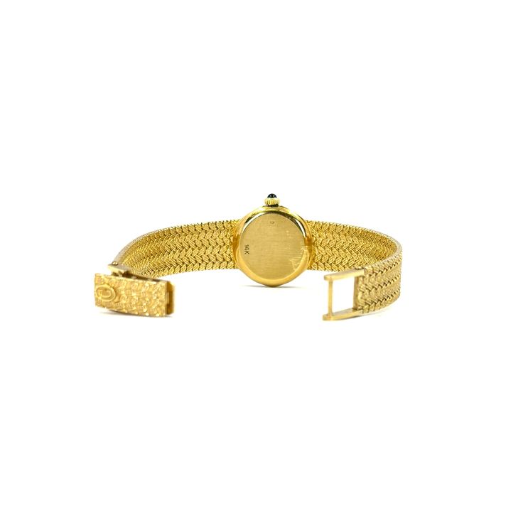 Pre-Owned 14 Karat Yellow Gold Concord Quartz Watch on Woven Gold Bracelet with Hexagonal Case and Champagne Stick Dial. Caseback Numbers 2098160-PS, 413482. 6 - 6.5 Inches Long with Folding Clasp. Quartz Watch, Champagne, Gold Bracelet, Yellow Gold, Bracelet, Yellow, Gold