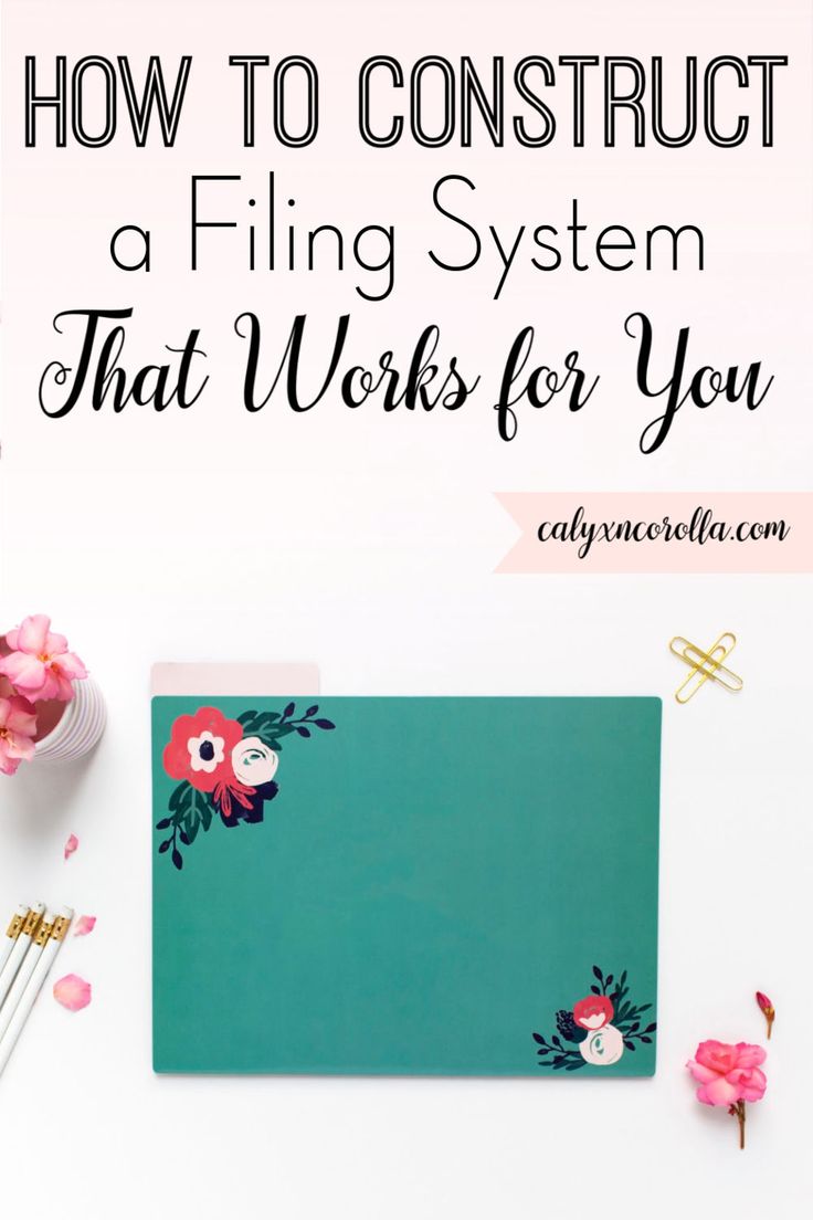 a desk with pink flowers on it and the words how to construct a filing system that works for you