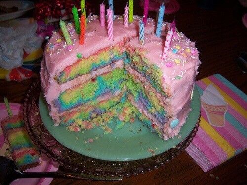 there is a cake with many candles on it