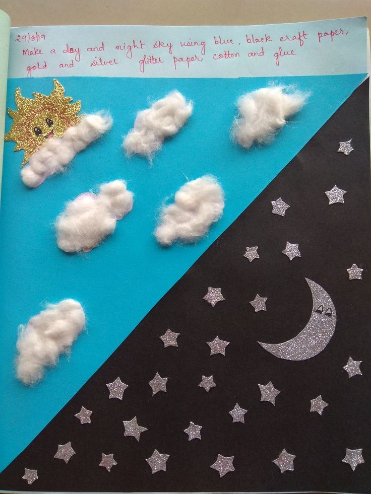 clouds and stars are arranged on a piece of paper