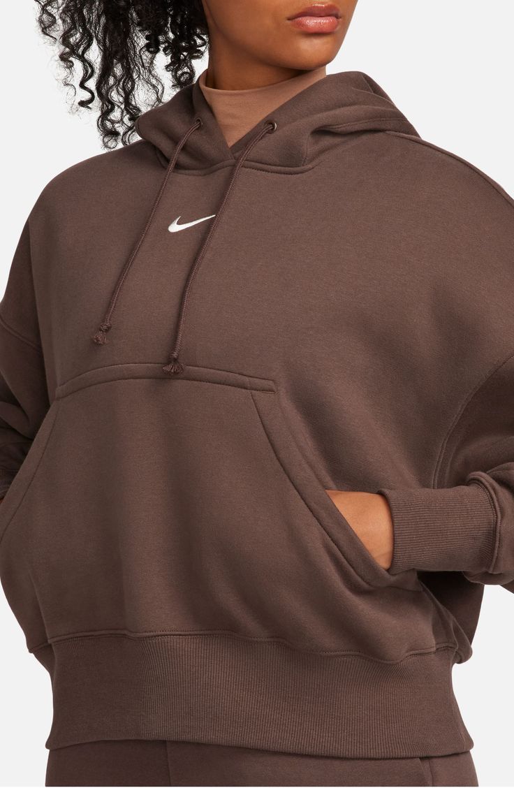 Supersoft fleece means all-day comfort in a dropped-shoulder hoodie perfect for relaxing at home or heading to the gym. 24" length (size Medium) Drawstring hood 80% cotton, 20% polyester Machine wash, tumble dry Imported Brown Nike Hoodie, Sweaters Nike, Nike Sportswear Phoenix Fleece, Nike Cropped Hoodie, Nike Quarter Zip, 2024 Wishlist, Nike Brown, Brown Hoodie, Nike Sweaters