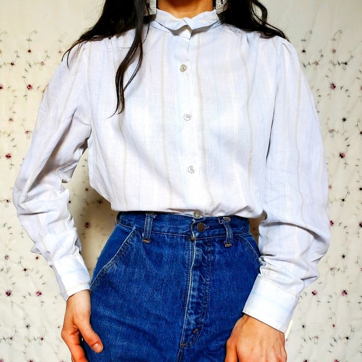 Beautiful Baby Blue And Cream Deadstock 1970s Super Soft Cotton Button Down Blouse With Modest Puff Poet Sleeves And An Adorable Unique Mini Collar. Simple Classy & Sophisticated Timeless Chic. Use My Code Shmolta For $10 Off Your First Purchase! Works On My Closet, Or Anyone Else's! Miss Personality Brand Modeled On 5'4-110lbs-Xs-32b 20" Width 17" Length (P2h) 17.5" Arm In 16" Shoulder Seams 1960s 1970s 1980s 60s 80s Vtg Sixties Seventies Eighties Retro Minimal Mom Grandma Office Work Business Minimal Mom, Poet Blouse, Gingham Shorts, Timeless Chic, Floral Embroidered Top, Pastel Stripes, Yellow Knit, Black And White Tops, Mom And Grandma