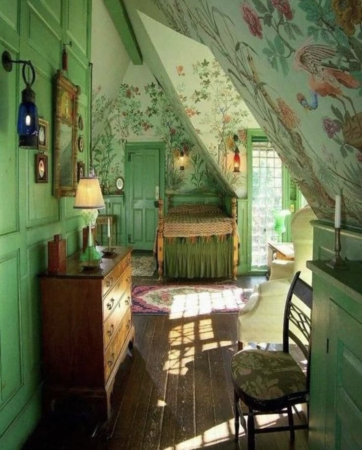 an instagram photo of a green bedroom with floral wallpaper on the walls and ceiling