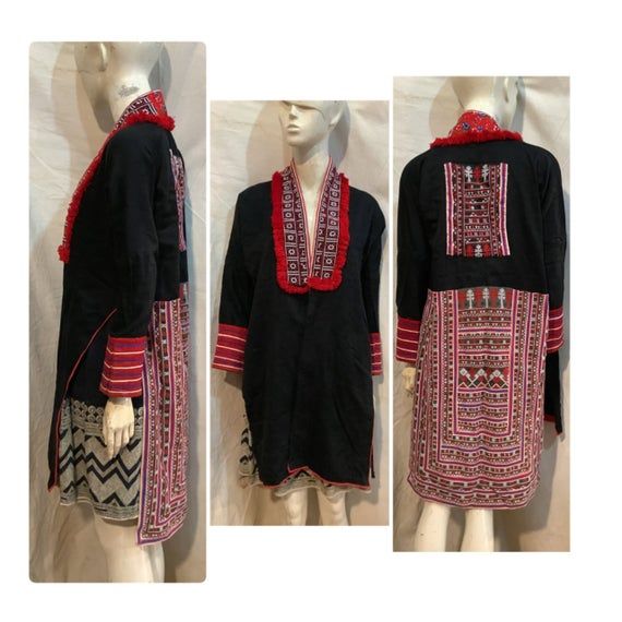 Vintage tribal Red Dao women tunic.Age is over 30 years and still very good condition.This sub-group has chosen multiple  embroidery colours,using mainly weave and grid stitch for the small symbols.The Red Dao always have a large embroidered panel on the tunic back,large embroidered sleeve cuffs and also between the shoulders,The black fabric is sateen fabric.MeasurementsLength  89 cm-96.5 cmSleeve to sleeve 142 cmChest 86 cm-96 cmArm length 40 cmUnderarm width 34 cmWeight 460 grams Small Symbols, Women Tunic, Silk Robe, Womens Tunics, Black Fabric, 30 Years, Varsity Jacket, Vietnam, Kimono Top