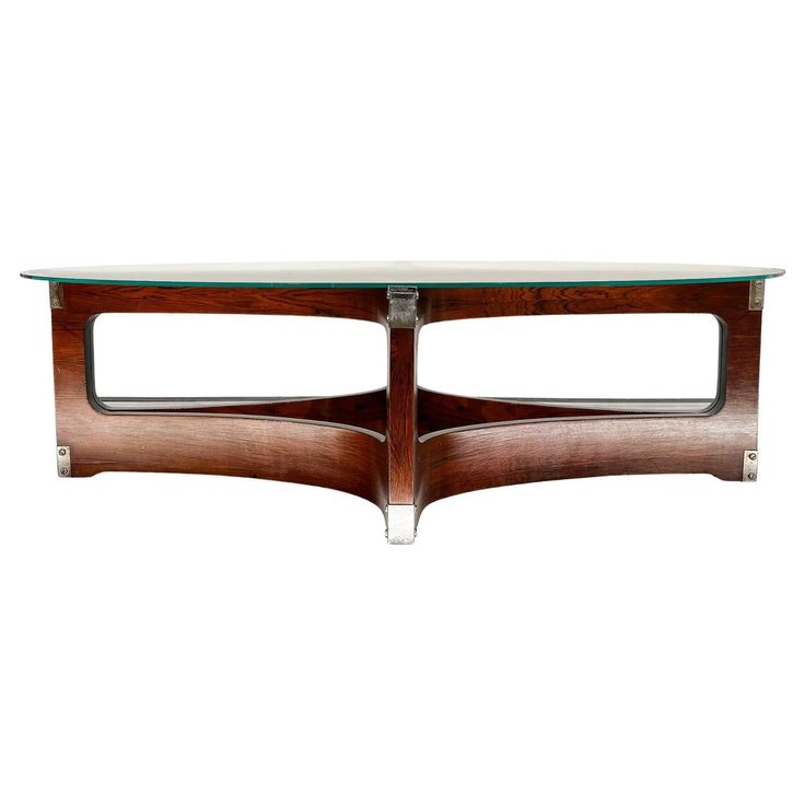 an art deco coffee table with glass top