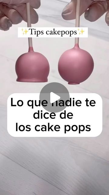 two pink cake pops on top of each other with the words tips cake pops above them