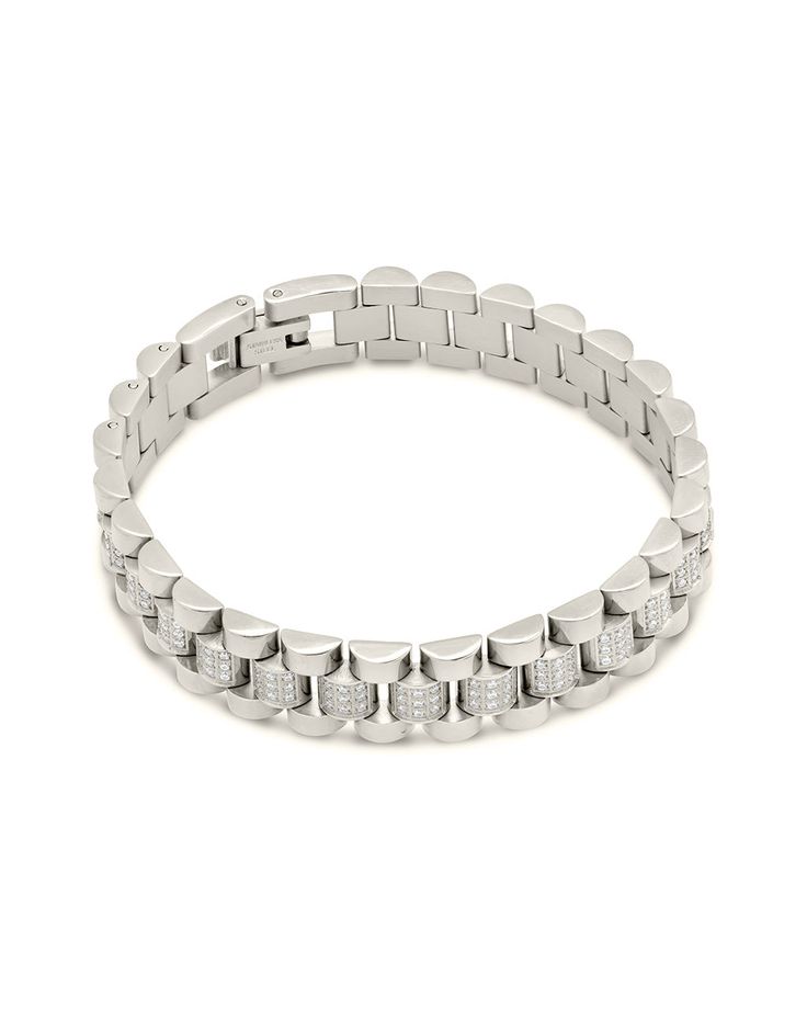 Add elegant details to your favorite looks by wearing this CZ accent watch band chain bracelet! This gorgeous piece is accented with CZ stones and is available in gold and silver tones. Materials: 14K gold or rhodium plated stainless steel, cubic zirconia Features: Measures 7" length, 0.45" width, 1mm CZ stones, Lead & Nickel free, foldover single-channel clasp Luxury White Gold Bracelets With Rhinestones, Luxury White Gold Bracelet With Rhinestones, Elegant White Gold Cuban Link Bracelet With Cubic Zirconia, Silver Diamond Bracelet With Solid Link Construction, Modern Silver Diamond Chain Bracelet, Luxury Stainless Steel Chain Bracelet With Rectangular Links, Luxury Silver Diamond Bracelet With Solid Link, Timeless Stainless Steel Jubilee Chain Bracelet, Silver Tennis Bracelet With Chain Link