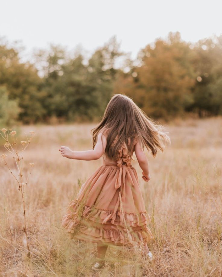 Celebrate the bond between mother and daughter with our fan favorite Nellie Ruffle Maxi Dress in rich Mocha! Perfectly designed for those cherished, twinning moments, this dress offers a blend of elegance, comfort, and a dash of playful sophistication.Note: Nellie's are made with modesty in mind! Infant and toddler sizes (0/3 - 5T) have an open back. The Tween and Mom sizes (6T - XXL) are made with more coverage. Key Features: Dreamy Ruffle Detailing: Adorned with soft, cascading ruffles, this d Mommy And Me Dress, Mommy And Me Dresses, Ruffle Maxi Dress, Cascading Ruffles, Mocha Color, Photoshoot Dress, Flowy Fabric, Photo Outfit, Ruffled Maxi Dress