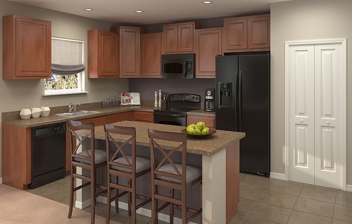 a kitchen with black appliances and wooden cabinets is shown in this image, there are four stools at the center of the island