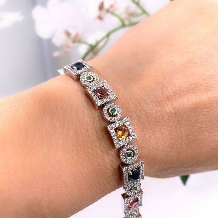 Sapphire & Diamond Bracelet Style: Multi-Color Sapphire & Diamond Link Bracelet Metal: 14K White Gold, 22.62 grams Size: 7.25'' long Sapphires: 12 Oval Cut, 12 Round Cut Color: Blue, Pink, Yellow, & Green Accent Diamonds: 384 Round Brilliant Cut  Hallmark: 14K GC3 Includes: Certified Appraisal, Elegant Bracelet Box Sku#OFCBRIVS1VS2-7.00TCWRBD4.00TCWR9850 Return Policy: Returns accepted up to 14 days. Payment Information: We accept payment by PayPal International Buyers: Buyer is responsible for Fine Jewelry Multi-stone Bracelet, Elegant Multi-stone Bangle Bracelets, Elegant Multi-stone Bracelet Jewelry, Elegant Multi-stone Bracelet, Multicolor Multi-stone Tennis Bracelet As Gift, Elegant Multicolor Cubic Zirconia Bracelets, Elegant Multicolor Tennis Bracelet As A Gift, Luxury Multicolor Tennis Bracelet As Gift, Elegant Multicolor Tennis Bracelet For Formal Occasions