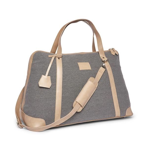 The perfect tote bag for any adventure. Large enough to fit several outfits and small enough to throw in your passenger seat, this light grey canvas bag features a long adjustable and removable shoulder strap, vegan leather accents, and satin interior lining. (#2727) •Dimensions: 26.50"L x 9.75"W x 13.75"H Grey Tote Bags, Grey Tote, Passenger Seat, Leather Duffle, Perfect Tote Bag, Monogrammed Items, Strap Tops, Weekender Bag, Duffel Bag