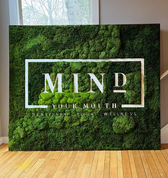 a green wall with the words mind on it