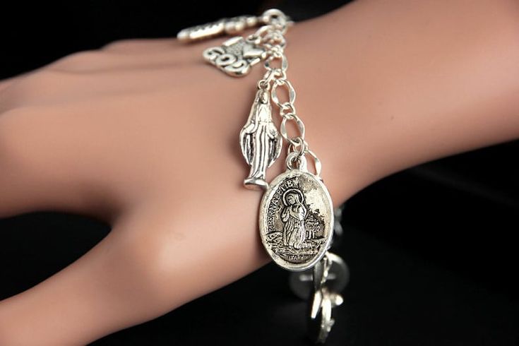 Saint Bernadette Bracelet. Catholic Bracelet. St Bernadette Charm Bracelet. Catholic Jewelry. Religious Bracelet. Handmade Jewelry - Etsy Nickel Free Silver Metal Rosary Bracelet, Nickel-free Silver Metal Rosary Bracelet, Symbolic Silver Rosary Bracelet Gift, Symbolic Silver Rosary Bracelet For Gifts, Symbolic Silver Rosary Bracelet, Silver Symbolic Rosary Bracelet As Gift, Vintage Silver Rosary Bracelet As Gift, Silver Rosary Bracelet With Charms As Gift, Adjustable Silver Rosary Bracelet With Charms