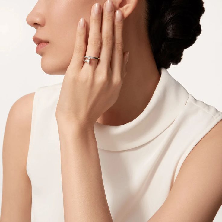 Elevate your style with the JUSTE RING 2.65MM in sleek silver. This elegant piece adds a touch of sophistication to any outfit, making it the perfect accessory for any occasion. Its understated yet refined design is sure to make a statement and impress all who see it. Embrace luxury and elevate your look with the JUSTE RING. ADDITIONAL INFORMATION Color: Silver Stone : No REF.: B4216900 Material:- 925 Sterling Silver - 18k Gold Plated- 18k Real Gold ( contact us via instagram) Width: 2.65 mm Rin Elegant Cartier Jewelry For Gift, Elegant Jewelry With Ring Detail, Elegant Cartier Rose Gold Jewelry, Cartier Rose Gold Wedding Ring, Elegant Cartier Round Rings, Classic Diamond White Open Ring Jewelry, Luxury White Gold Rings In Sterling Silver, Classic Open Ring In Diamond White, Classic Open Ring In Diamond White Color