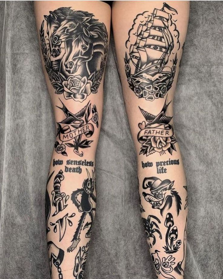 the legs are covered with tattoos on them