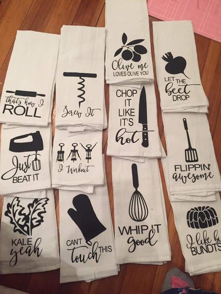 the kitchen towels are laid out on the floor with their names and designs printed on them