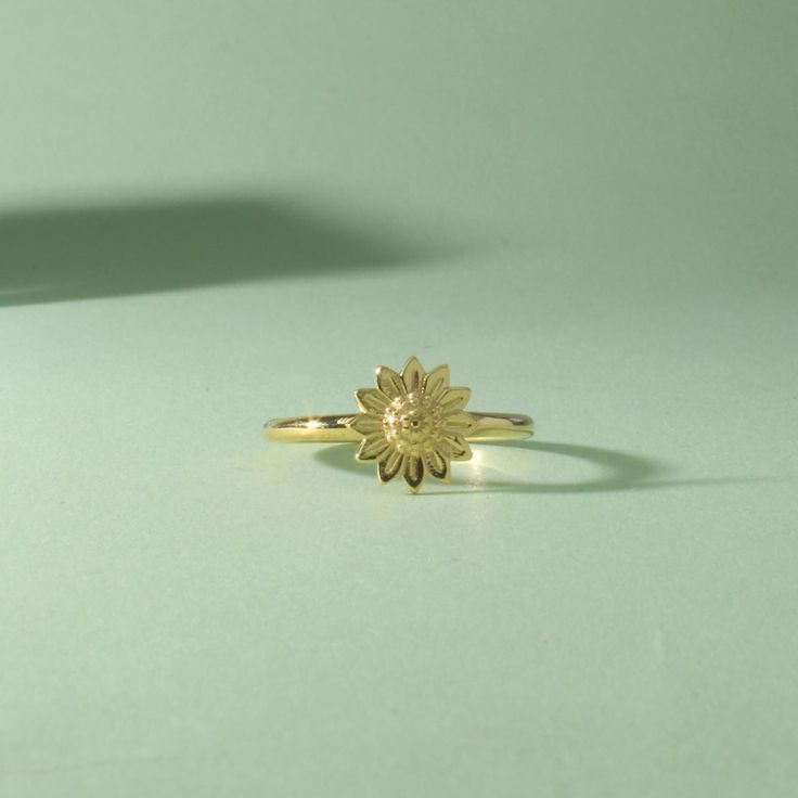 Gold Sunflower Ring 14k Solid Gold Ring Summer Time Ring. A great choice for birthdays, Valentine's Day and special occasions. ➤ Ring Details * Silver/ 14k / 18k Yellow Gold * Gold Color Options; 14K / 18k White, Yellow, Rose Gold * Band Width: 1.70 mm * Band Thickness: 1.30 mm * Ready to Ship 3-5 Business Days 💍 ISEA Jewels' pieces are handcrafted by 10-15 years of experienced craftsmen and made to order in a very short time. 🎁 All pieces come in a quality and hygienic gift box enclosed in a Silver Flower Ring, Sunflower Ring, Solid Gold Ring, Rose Gold Band, Flower Ring, Ring Gold, Stackable Rings, 10k Gold, Summer Time