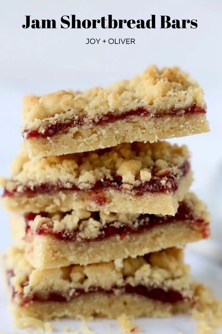 jam shortbread bars stacked on top of each other with the words, jam shortbread bars