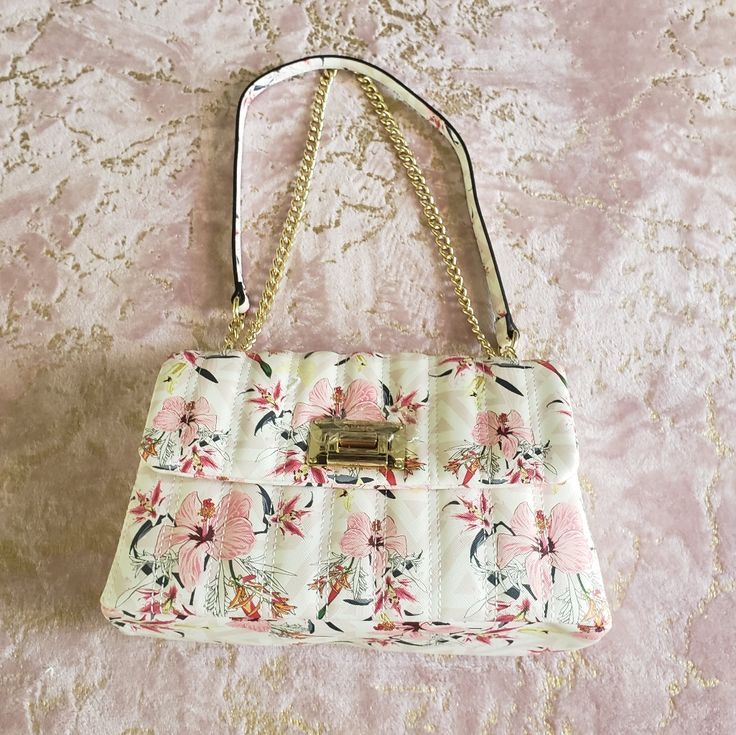 Nwot* Brand New Without Tags Brand: Aldo Size: See Pics Color: Multi Floral Aldo | Aldo Floral Bag Condition: Brand New Without Tags, In Excellent Condition. No Visible Rips/Stains Or Holes. * No Trades * Bundle And Save * Message Me With Any Questions * Please Review Pics/Video Carefully Smoke Free Dog Friendly Home! White Feminine Shoulder Bag, Feminine White Rectangular Shoulder Bag, White Feminine Crossbody Bag, Feminine White Crossbody Bag, White Rectangular Shoulder Bag For Day Out, Feminine White Shoulder Bag With Detachable Strap, Feminine White Shoulder Bag For Everyday Use, Feminine White Shoulder Bag For Everyday, White Feminine Everyday Bags