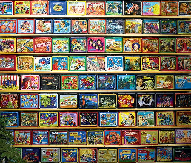 there is a wall full of comic books