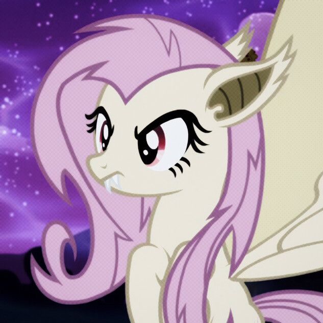 the pinkie pony is looking at something in front of her face with bats on it