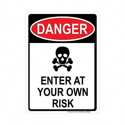 a danger sign with a skull and crossbones on the bottom reads danger enter at your own risk