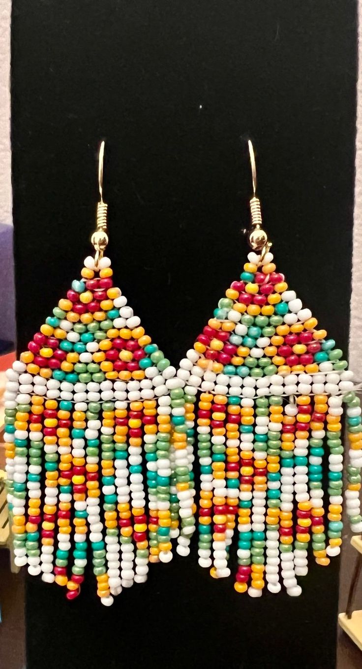 Traditional Fringed Beaded Earrings, Traditional Beaded Earrings With Fringe And Round Beads, Traditional Fringe Beaded Earrings With Round Beads, Traditional Fringe Beaded Drop Earrings, Traditional Beaded Fringe Dangle Earrings, Traditional Multicolor Fringe Earrings, Traditional Multicolor Beaded Earrings With Tassels, Traditional Multicolor Beaded Tassel Earrings, Traditional Multicolor Beaded Fringe Tassel Earrings