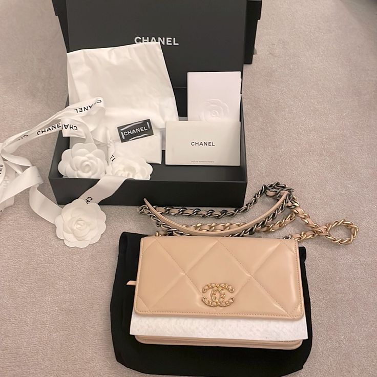 Chanel Mini In Blush Lamb Leather With Gold And Silver Strap. Great Condition. Few Light Dents From Storage, But No Holes Or Perforations In The Leather. Metal In Great Condition. Can Be Worn Crossbody, Shoulder Or In Hand Used A Few Times. Purchased Chanel Dubai Mall. See Receipts And Authenticity Card. 31220655. Comes With Original Box, Ribbons, Dust Bag, Receipt, Etc As Seen In Photo. Designer Beige Flap Shoulder Bag, Designer Crossbody Flap Bag, Designer Beige Bags For Everyday Luxury, High-end White Flap Bag For Evening, White High-end Evening Flap Bag, High-end White Evening Flap Bag, Designer Beige Flap Bag With Detachable Strap, Luxury Beige Bags For Gifts, Luxury Beige Bags For Gift