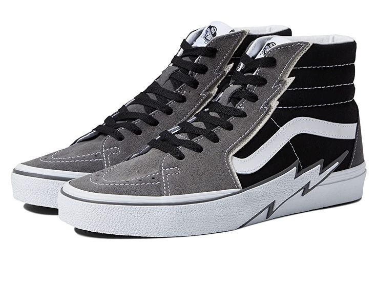 Vans Sk8-Hi Bolt - Shoes : Pewter/Black : Level up your street style by wearing the cool and casual Vans Sk8-Hi Bolt Shoes. Leather and textile upper. Textile lining and insole. Classic lace-up closure. Thunderbolt detailing along with the eyelets and bumper. Reinforced toe caps. Supportive padded collars. Signature rubber waffle outsole with high traction and durability. Imported. Measurements: Weight: 1 lb 2 oz. Shaft: 4 ½ in. Measurements: Weight: 1 lb 2 oz Shaft: 4 1 2 in Product measurement Vans Urban Sneakers With Laces, Urban Vans Sneakers With Laces, Urban Vans Sneakers, Urban Vans Lace-up Sneakers, Gray Mid-top Skate Shoes With Laces, Lace-up Canvas Shoes With Contrast Sole For Skateboarding, Vans Lace-up Canvas Shoes, Vans Lace-up Sneakers, Gray High-top Sneakers With Vulcanized Sole For Streetwear