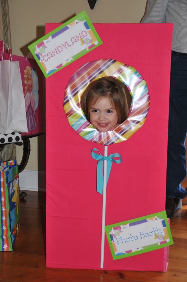 a child's birthday photo in a pink paper bag