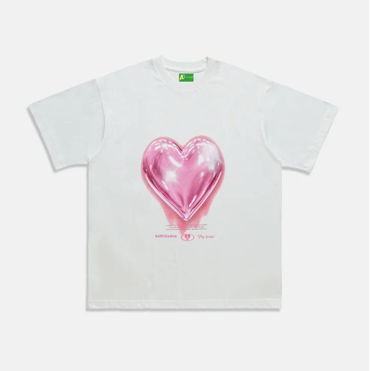 **Fire designs with luxury blanks, Only at aoklok graphic brand. Indulge in luxurious style with the AG Give Me Your Heart T-Shirt. Crafted with soft and comfortable fabric, this t-shirt features a unique print of a heart-shaped tree that symbolizes love and growth. Perfect for art and fashion lovers, this t-shirt is a must-have for anyone looking to elevate their wardrobe. Features: -100% Cotton -Crew Neckline -Super Soft Fabric -Loose -Solid Color -Regular fit -Urban style Trendy Heart Graphic T-shirt For Streetwear, Valentine's Day Graphic Tee With Graphic Print, Trendy Valentine's Day T-shirt, Trendy Heart-shaped Letter Print T-shirt, Casual Heart Print T-shirt For Streetwear, Trendy Pink T-shirt With Heart Print, Heart-shaped Graphic Tee With Screen Print, Cotton T-shirt With Heart Graphic For Streetwear, Casual Valentine's Day Graphic T-shirt